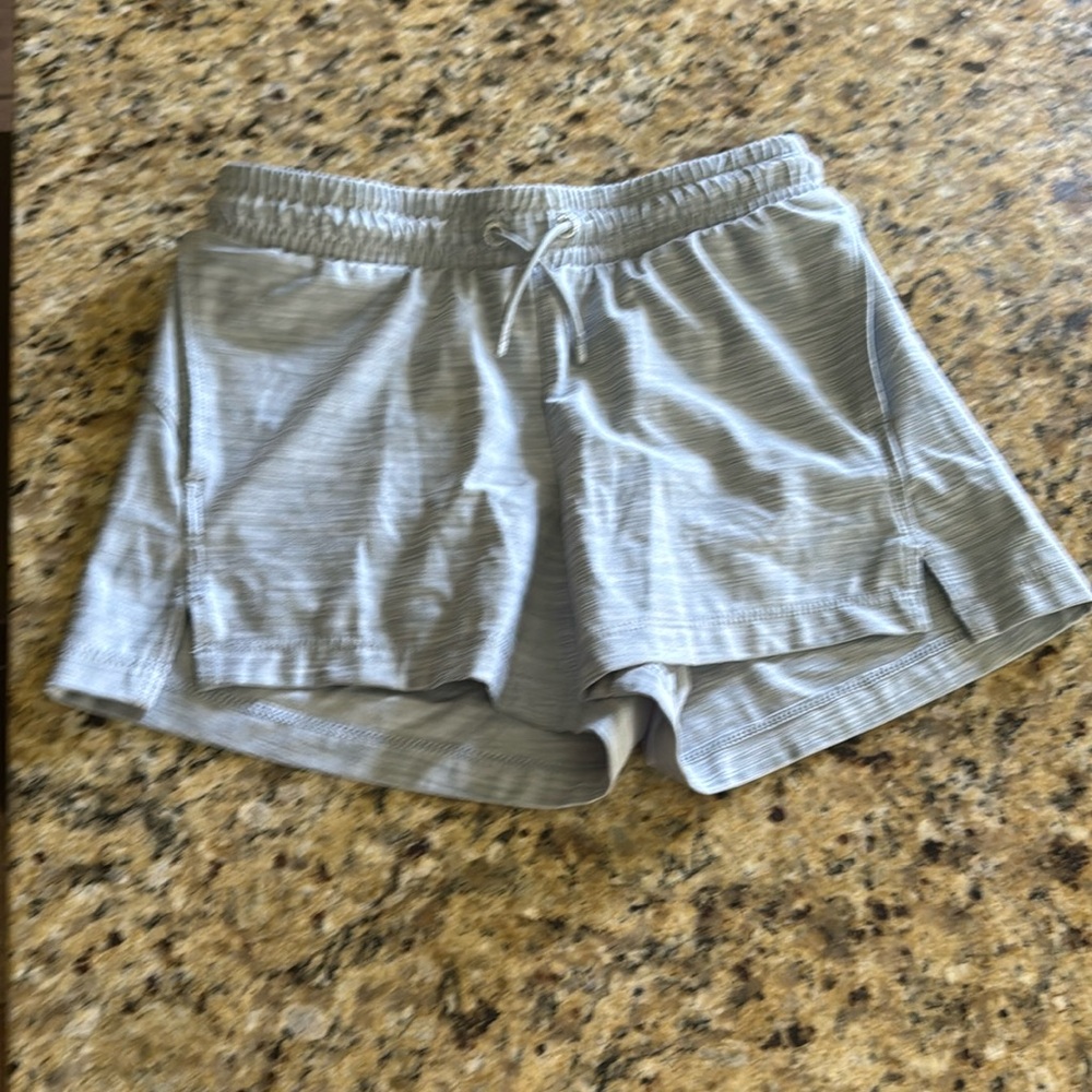 Girls gray athletic shorts with pockets and drawstring